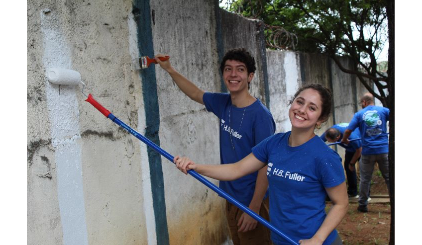 H.B. Fuller employees volunteering to paint a nonprofit AMEM facility