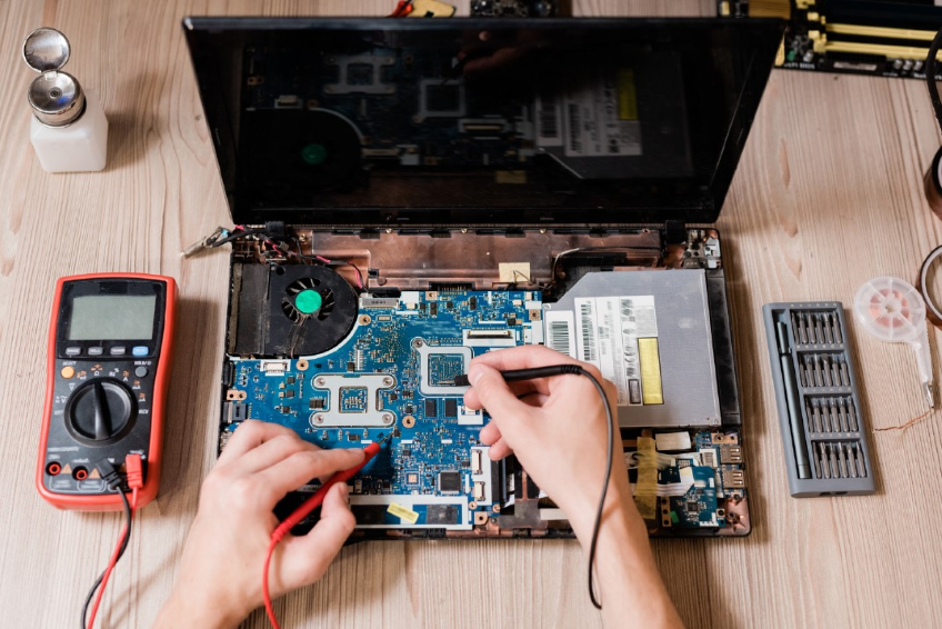 Laptop being disassembled for repairing