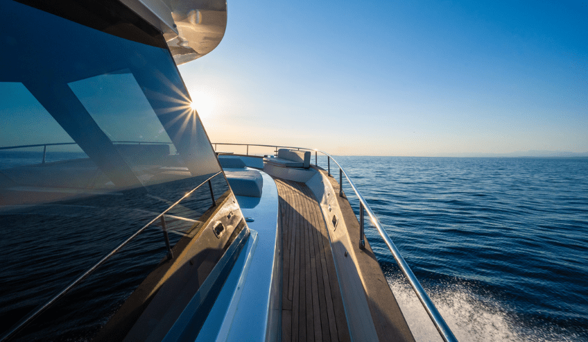 A luxury yacht at sea on bright sunny day