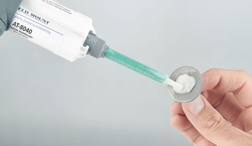 Weldmount adhesive application with glue gun